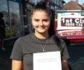 Zoe with Driving test pass certificate